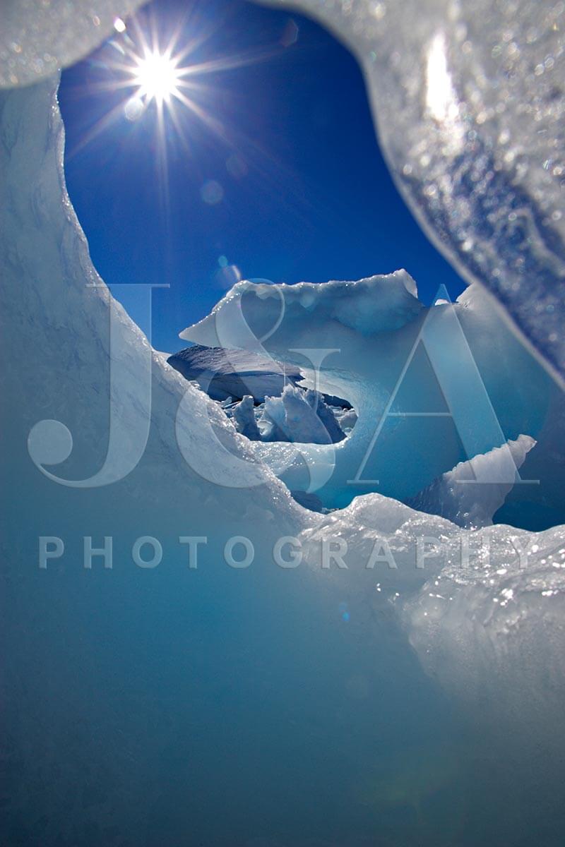 Fine art photographic print by Jonathan and Angela Scott, depicting beautiful sky and ice in Antarctica.