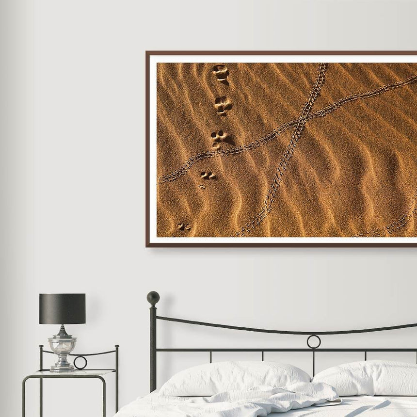 Fine art photographic print by Jonathan and Angela Scott, depicting footprints in the sand in Sossusvlei, Namibia.